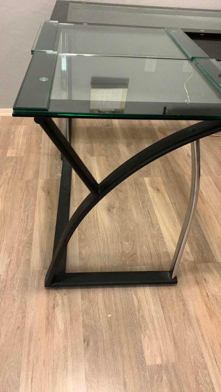 Photo 1 of L SHAPED GLASS AND METAL  DESK 56” X 56” H 30”
