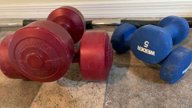 Photo 1 of CURLING BAR AND DUMBBELLS AND YOGA MATS