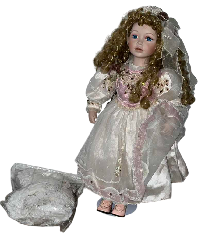 Photo 1 of VINTAGE BISQUE PORCELAIN DOLL WITH EXTRA CLOTHING