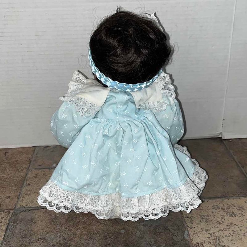Photo 1 of VINTAGE LEE MIDDLETON PORCELAIN DOLL WITH EXTRA CLOTHES