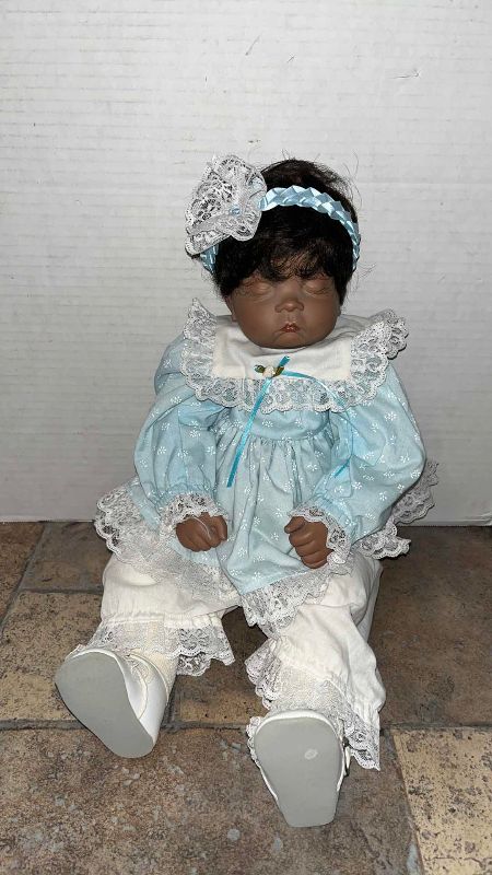 Photo 1 of VINTAGE LEE MIDDLETON PORCELAIN DOLL WITH EXTRA CLOTHES