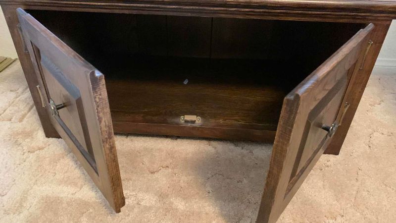Photo 1 of GUN AND RIFLE CABINET WITH EAR PROTECTION MUFFS 31” X 17” H 64”