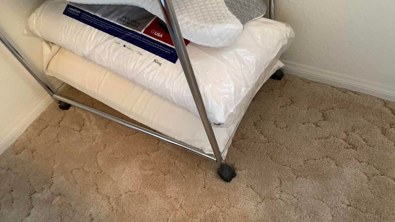 Photo 1 of METAL STORAGE CART WITH WHEELS 30” X 18” H 71” LINENS AND PILLOWS NOT INCLUDED