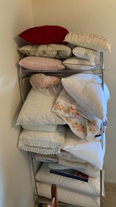 Photo 1 of METAL STORAGE CART WITH WHEELS 30” X 18” H 71” LINENS AND PILLOWS NOT INCLUDED