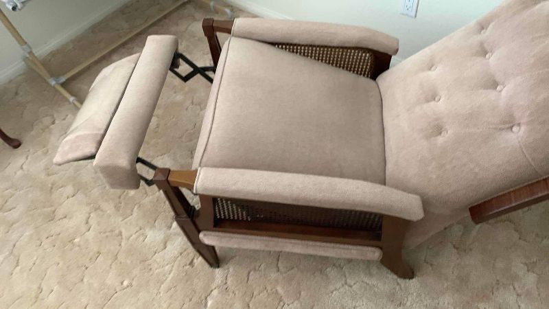 Photo 1 of FABRIC AND WOOD RECLINER CHAIR 25” X 34” H 31”
