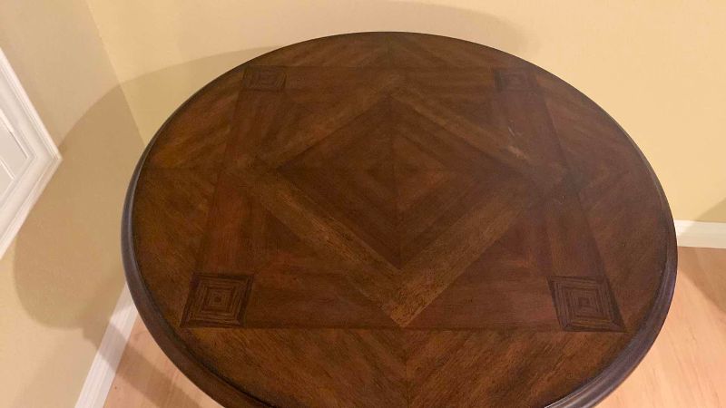 Photo 1 of INLAID WOODEN CIRCULAR SIDE TABLE 28” X 30”
