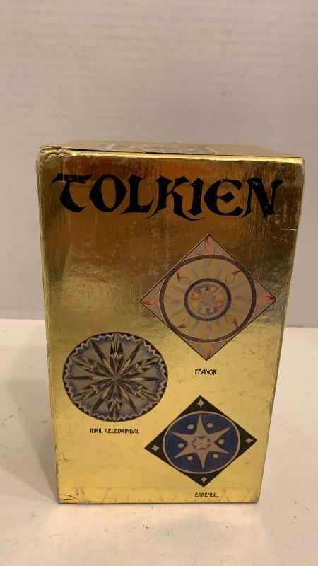 Photo 1 of VINTAGE J.R.R TOLKIEN GOLD FOIL LORD OF THE RINGS TRILOGY BOX SET PLUS THE HOBBIT BOOK