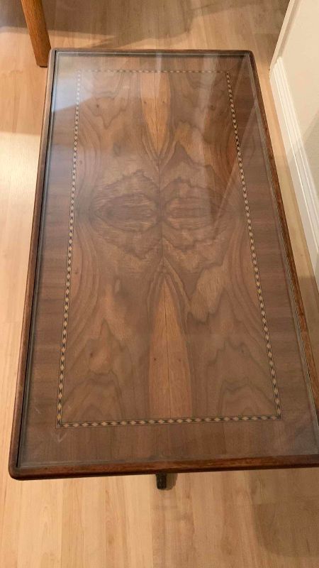 Photo 1 of VINTAGE WOOD INLAID TABLE WITH CLAW FEET GLASS TOP 34” X 18” H 17”