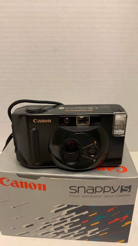 Photo 1 of CANON SNAPPY S AND OLYMPUS SHOOT AND GO CAMERAS