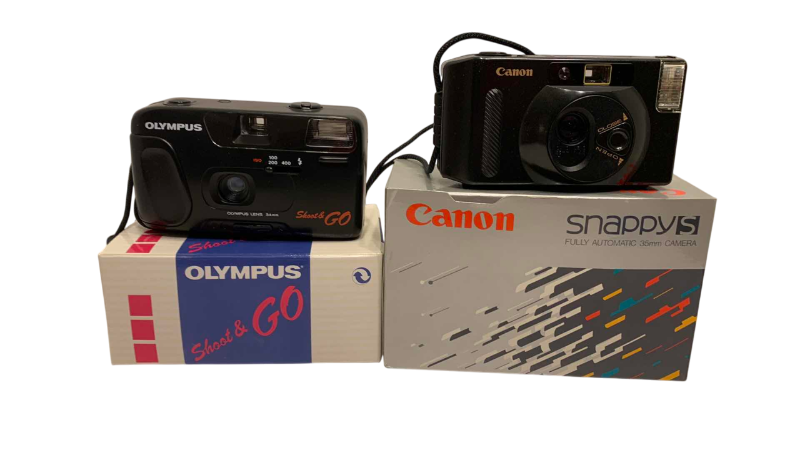 Photo 1 of CANON SNAPPY S AND OLYMPUS SHOOT AND GO CAMERAS