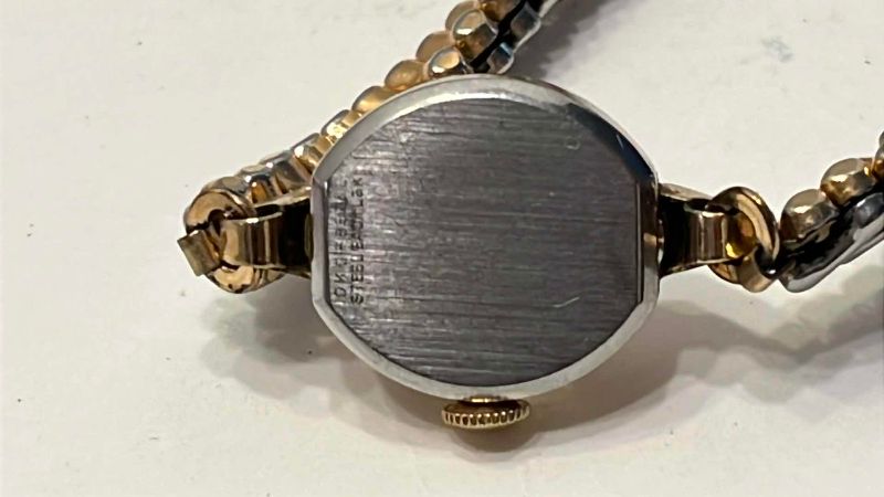 Photo 1 of VINTAGE WITTNAUER GOLD TONE AND STAINLESS STEEL WATCH
