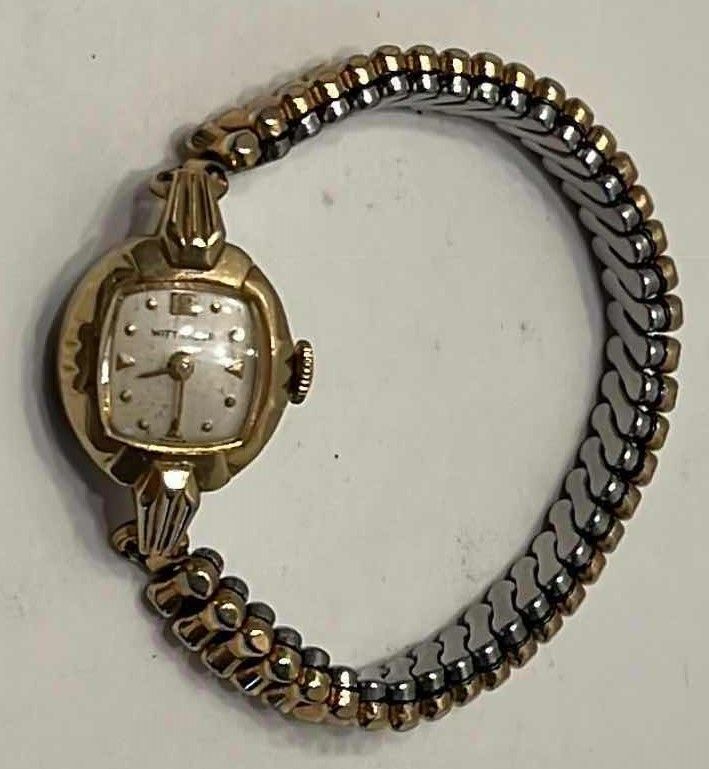 Photo 1 of VINTAGE WITTNAUER GOLD TONE AND STAINLESS STEEL WATCH