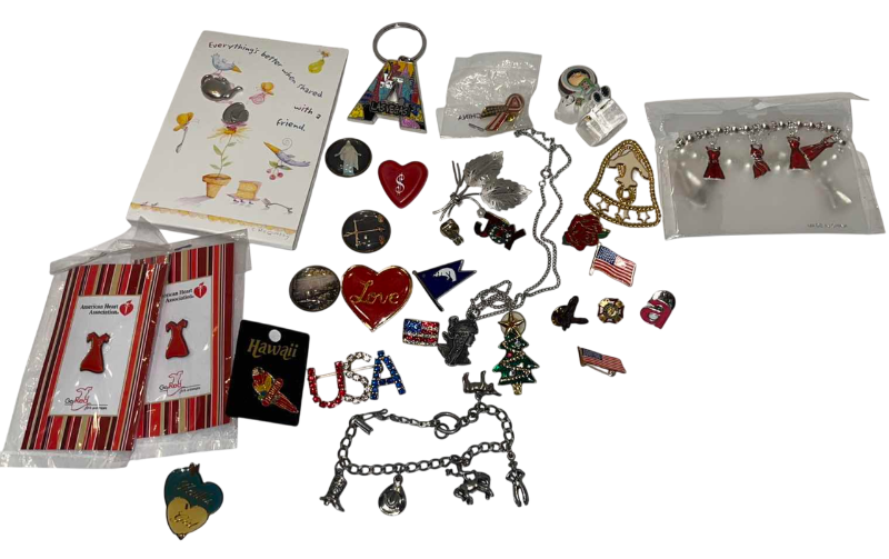 Photo 1 of PINS AND BRACELETS