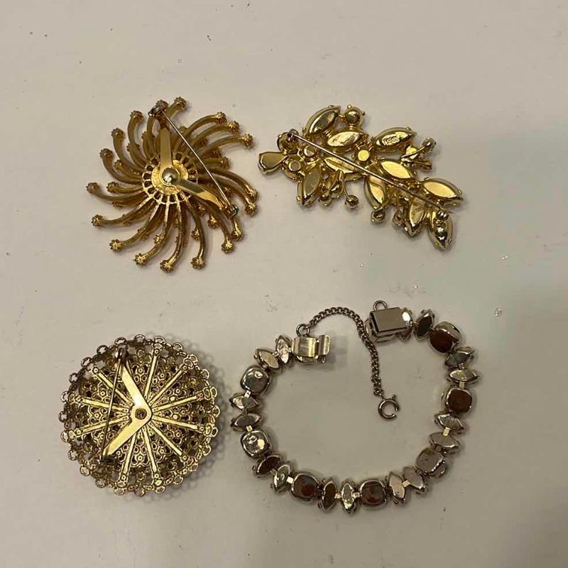 Photo 1 of 3 PINS AND A BRACELET GOLD TONE