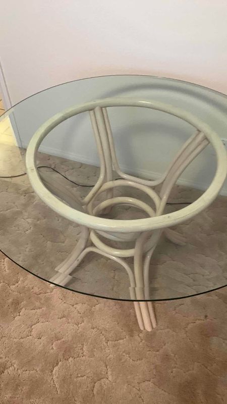 Photo 1 of WOOD AND GLASS DINING TABLE 42” CIRCUMFERENCE