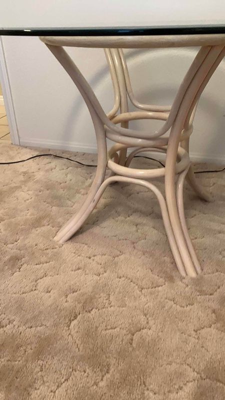 Photo 1 of WOOD AND GLASS DINING TABLE 42” CIRCUMFERENCE