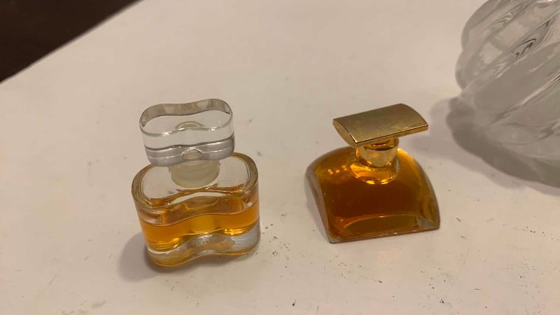 Photo 1 of 4-PERFUME SAMPLES AND A DECANTER