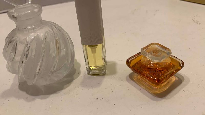 Photo 1 of 4-PERFUME SAMPLES AND A DECANTER
