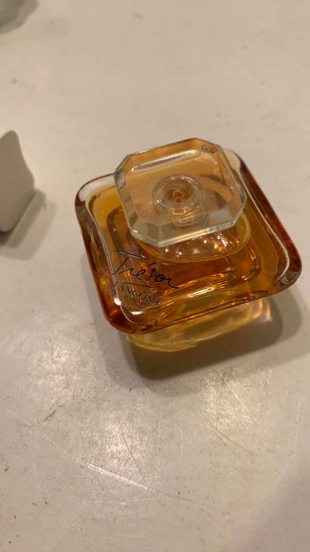 Photo 1 of 4-PERFUME SAMPLES AND A DECANTER