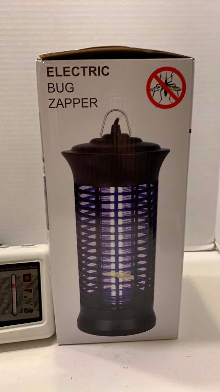Photo 1 of VINTAGE TIMEX NIGHTSTAND CLOCK AND ELECTRIC BUG ZAPPER