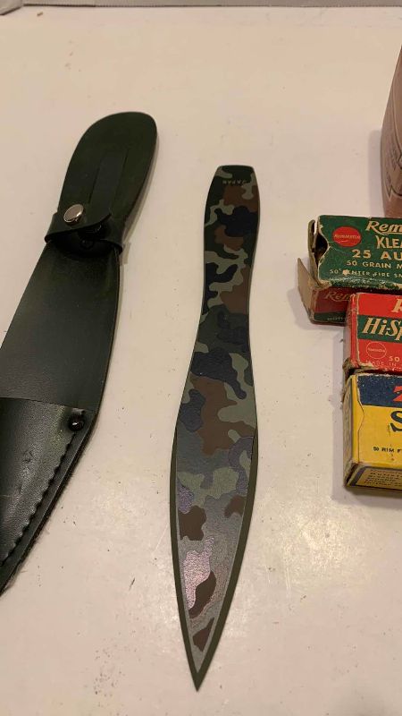 Photo 1 of VINTAGE .22 AND .25 AMMUNITION, BB’S AND A CAMO THROWING KNIFE