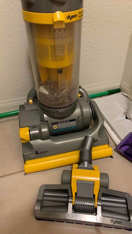 Photo 1 of DYSON ALL FLOORS VACUUM AND A SWIFTER