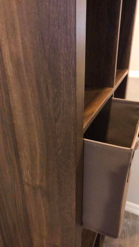 Photo 1 of WOODEN SHELVING UNIT WITH CLOTH DRAWER BASKETS 31” X 16” H 59”