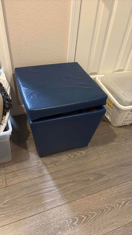 Photo 1 of BLUE FAUX LEATHER STORAGE OTTOMAN 17” X 17” X 17” H