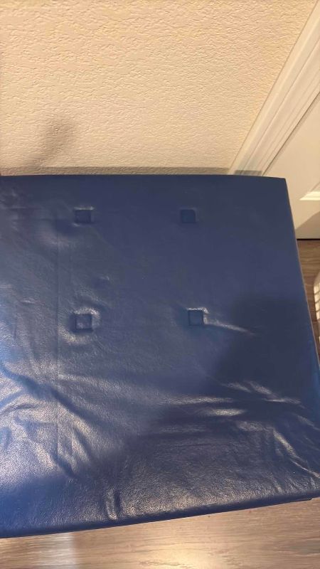 Photo 1 of BLUE FAUX LEATHER STORAGE OTTOMAN 17” X 17” X 17” H