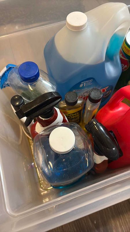 Photo 1 of TOTE OF CLEANING SUPPLIES