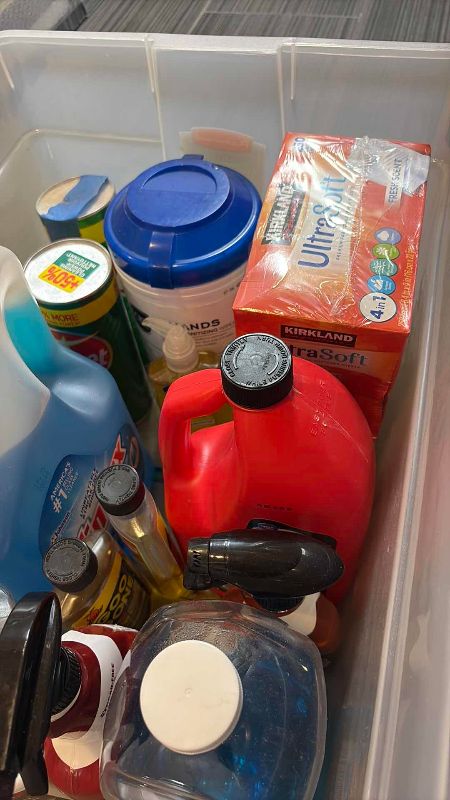 Photo 1 of TOTE OF CLEANING SUPPLIES