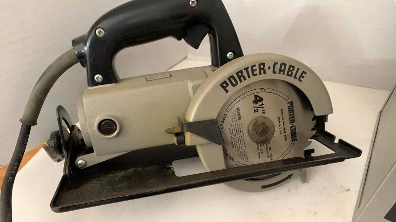 Photo 1 of PORTER CABLE 4 1/2” RADIAL SAW AND CASE