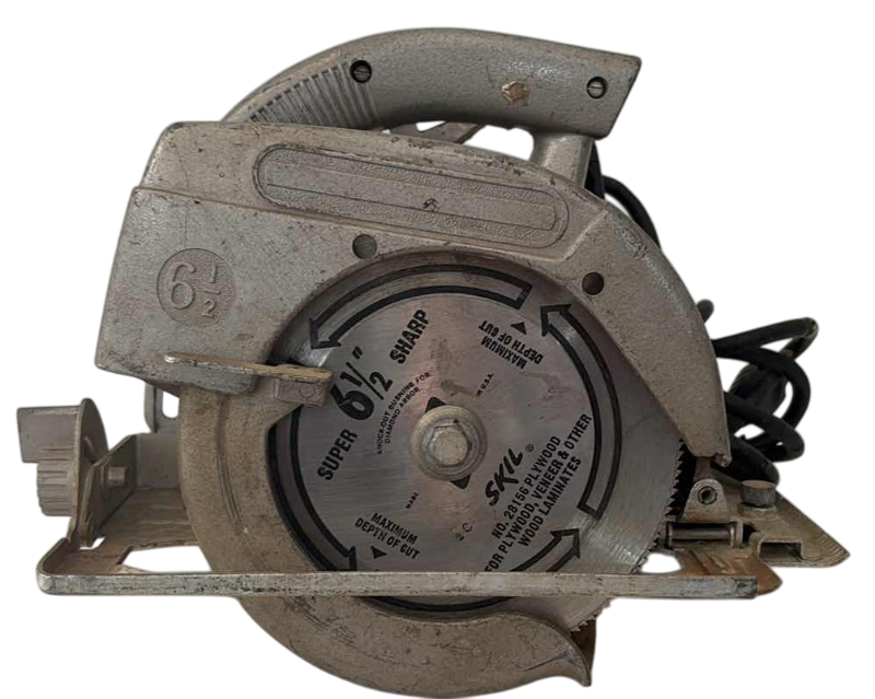 Photo 1 of VINTAGE SKIL CIRCULAR SAW 6 1/2”  WITH A SKIL WOOD BLADE AND STEEL CASE