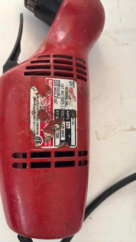 Photo 1 of MILWAUKEE REVERSING DRILL 3/8” MODEL 0375-1
