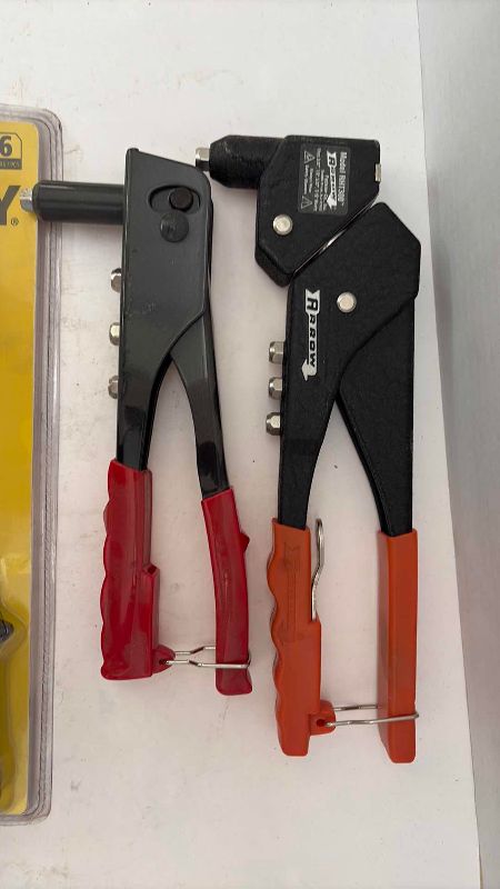 Photo 1 of 3 RIVETERS