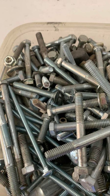 Photo 1 of CONTAINER OF VARIOUS SIZES OF BOLTS