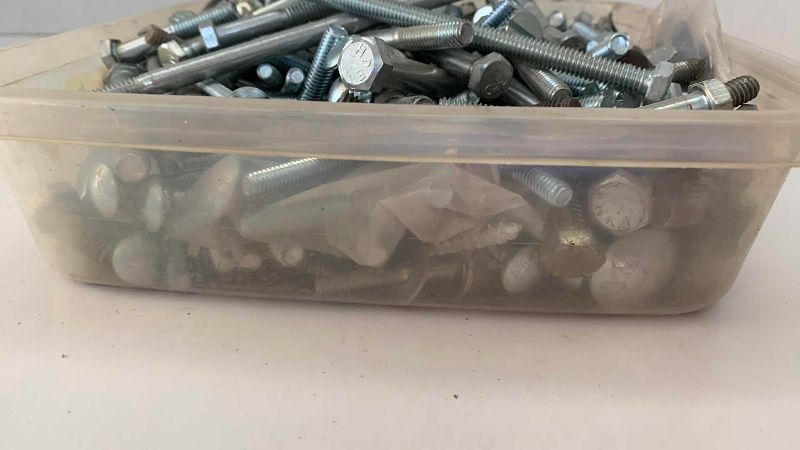 Photo 1 of CONTAINER OF VARIOUS SIZES OF BOLTS