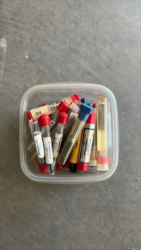 Photo 1 of CONTAINER OF DIFFERENT SIZE CARBIDE STRIPS