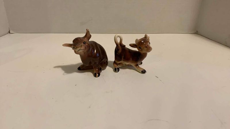Photo 1 of BULL AND COW STATUES AND SALT AND PEPPER SHAKERS