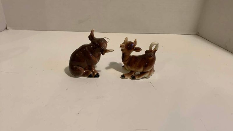 Photo 1 of BULL AND COW STATUES AND SALT AND PEPPER SHAKERS