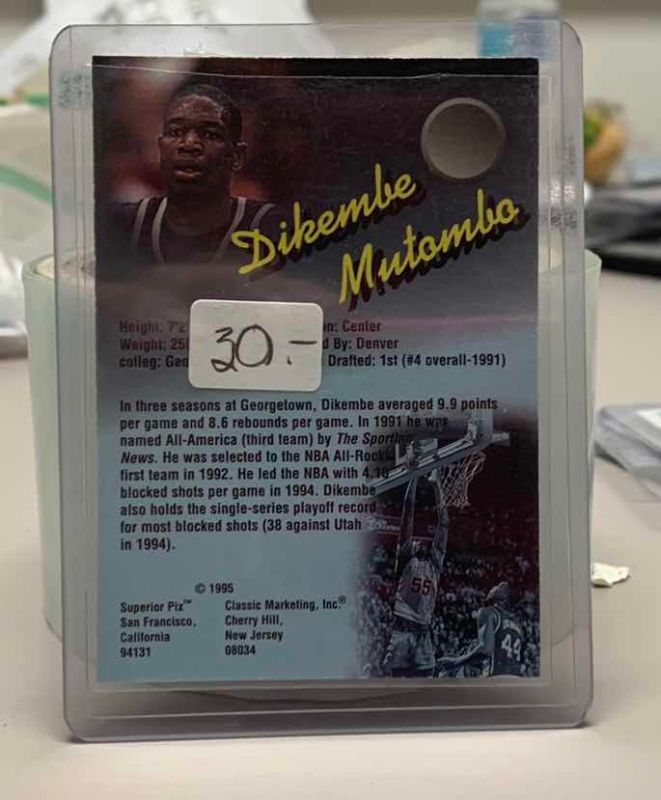 Photo 1 of 1995 AUOTGRAPHED DIKEMBE MUTOMBO CLASSIC MARKETING CO CARD