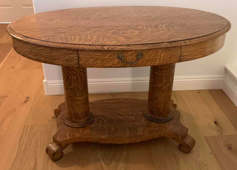 Photo 1 of QUARTER SAWN OAK DOUBLE PEDESTAL OVAL LIBRARY TABLE 47” X 29” H 30”
