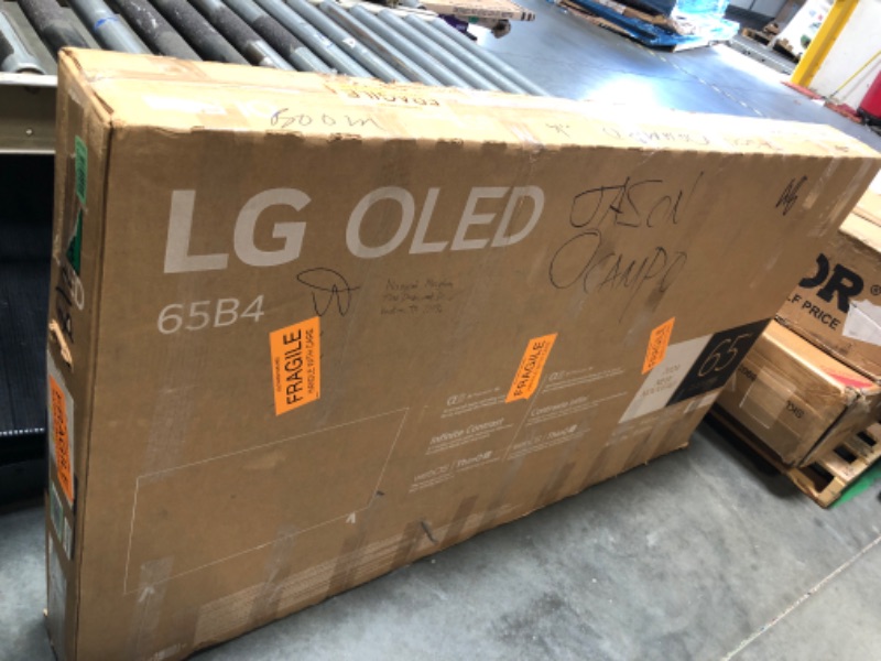 Photo 1 of ** ONLY PARTS BROKEN ** LG 65-Inch Class OLED B4 Series Smart TV 4K Processor Flat Screen with Magic Remote AI-Powered with Alexa Built-in (OLED65B4PUA, 2024)