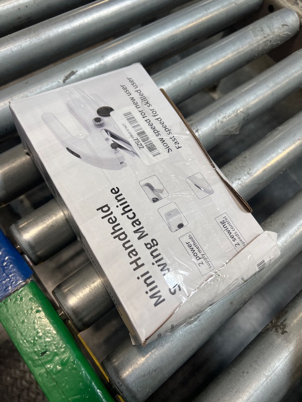 Photo 1 of Handheld Sewing Machine,Two dear,Mini sewing machine,Easy to Use and Fast Stitch Suitable for Clothes,Fabrics, DIY Home Travel Electric Handheld Sewing Machine for Beginners.