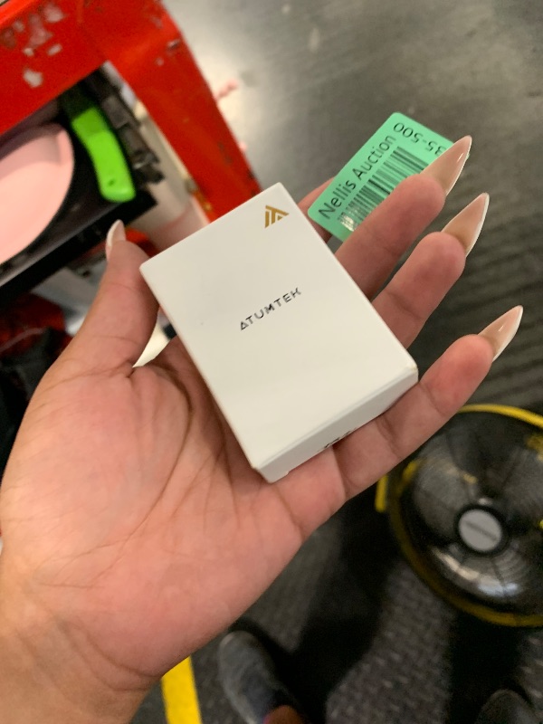 Photo 1 of ATUMTEK Bluetooth Remote Shutter, Carbon Fiber Design, Rechargeable Camera Remote Control for iOS & Android Smartphones, Compact and Portable, with Type-C Charging, 10m Remote Range, Bluetooth 5.0