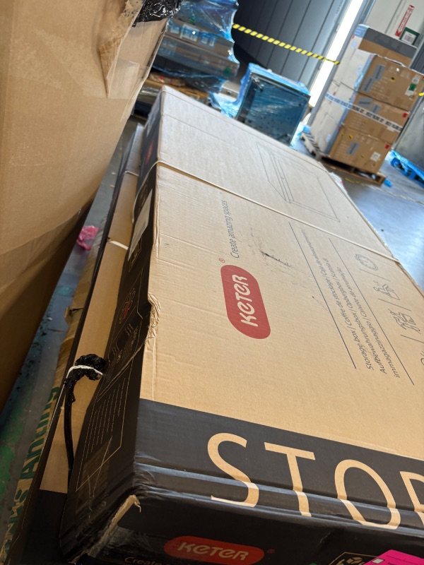 Photo 1 of **BRAND NEW AND FACTORY SEALED BUT MINOR DAMANGE TO ITEM ON CORNER FROM TRANSPORTATION **
 Keter Westwood 570L Outdoor 75% recycled Garden Furniture Storage Box Brown Wood Panel Effect ; Fade Free ; All Weather Resistant ; Safe and Secure ; Zero Maintenan