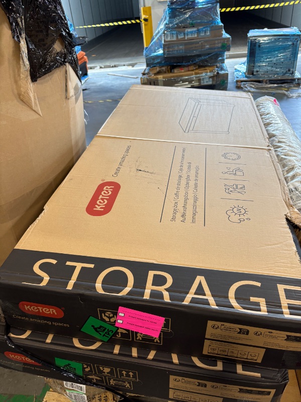 Photo 1 of **BRAND NEW AND FACTORY SEALED BUT MINOR DAMANGE TO ITEM ON CORNER FROM TRANSPORTATION **
 Keter Westwood 570L Outdoor 75% recycled Garden Furniture Storage Box Brown Wood Panel Effect ; Fade Free ; All Weather Resistant ; Safe and Secure ; Zero Maintenan