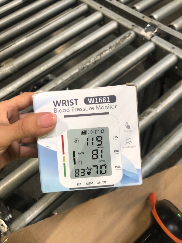 Photo 1 of MMIZOO Wrist Blood Pressure Monitor Large LCD Display BP Machine Adjustable Cuff 5.31-7.68 inch Automatic 99x2 Sets Memory with Carrying Case for Home Use (W1681)