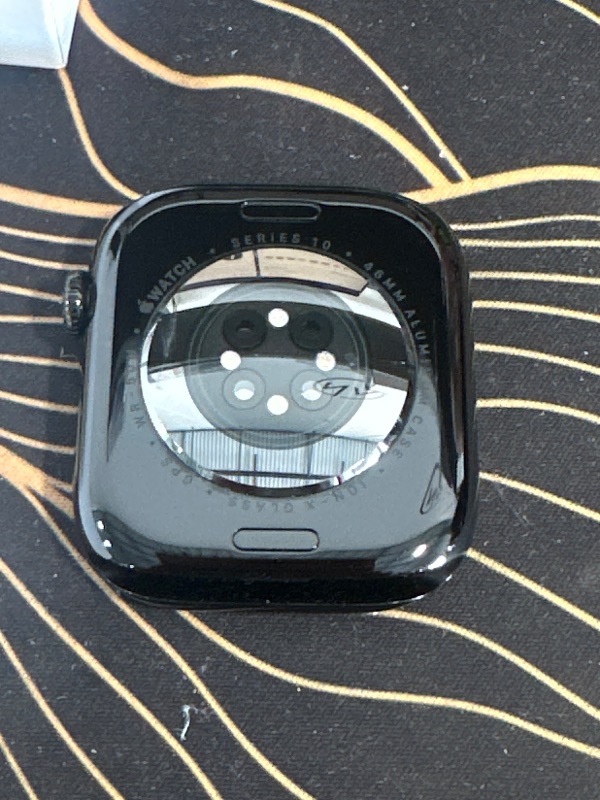 Photo 1 of **LOCKED** Apple Watch Series 10 [GPS 46mm case] Smartwatch with Jet Black Aluminium Case with Black Sport Band - M/L. Fitness Tracker, ECG App, Always-On Retina Display, Water Resistant