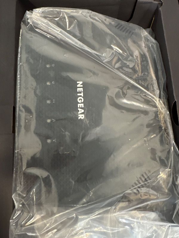 Photo 1 of NETGEAR Dual Band WiFi 6 Router, WPA3, Parental Control, Adaptive QoS, Port Forwarding, WAN aggregation, lifetime internet security and AiMesh support, Dual 2.5G Port
***missing power cable***